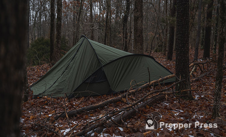 right side view of camo tent