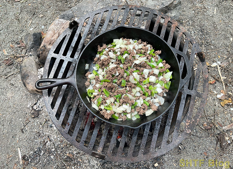 browning burger, peppers, and onions