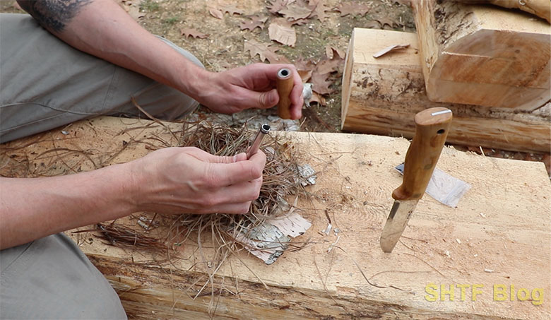 loading char cloth into fire pistons