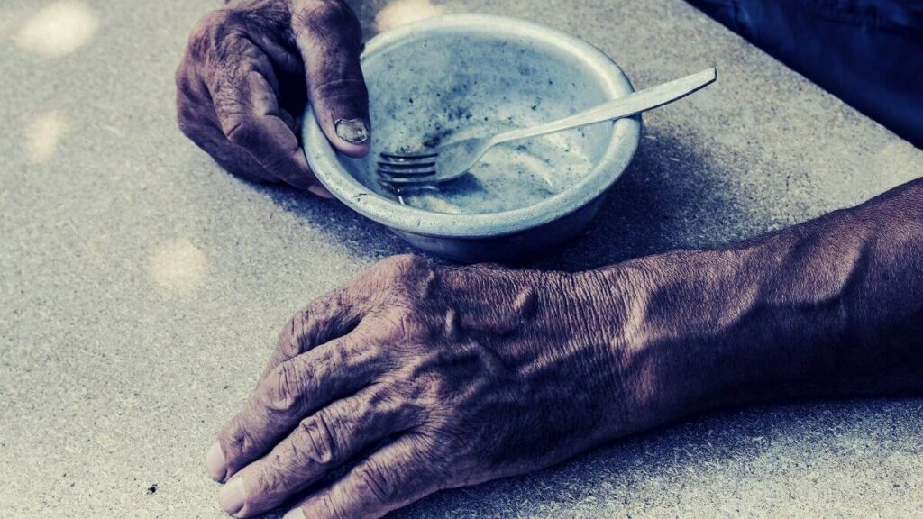 poor old man's hands with no food