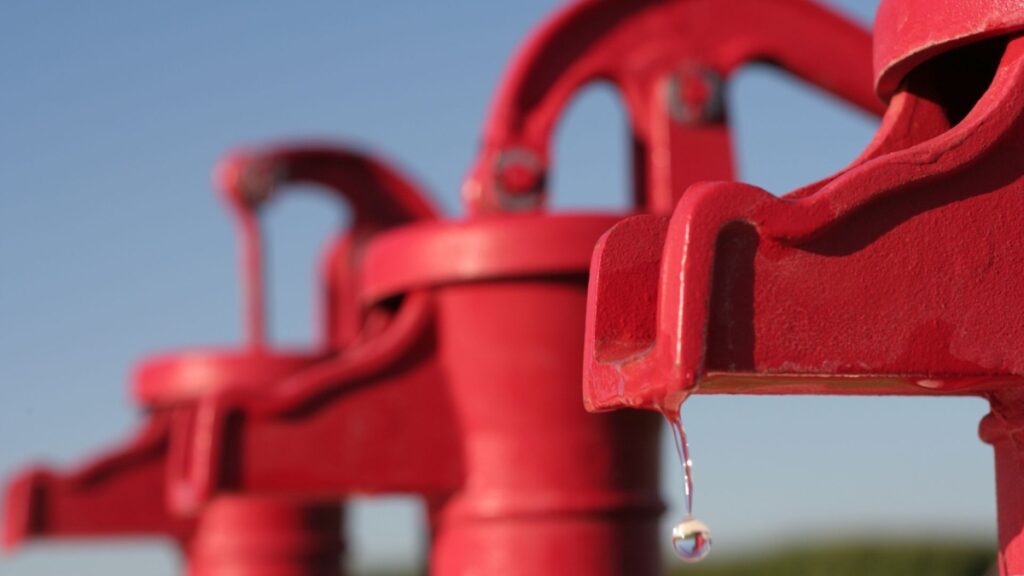 red emergency hand pump