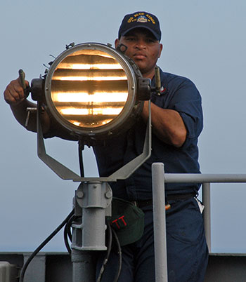 sailor signaling with Morse code