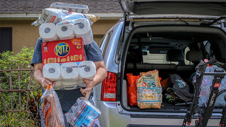 man prepping supplies